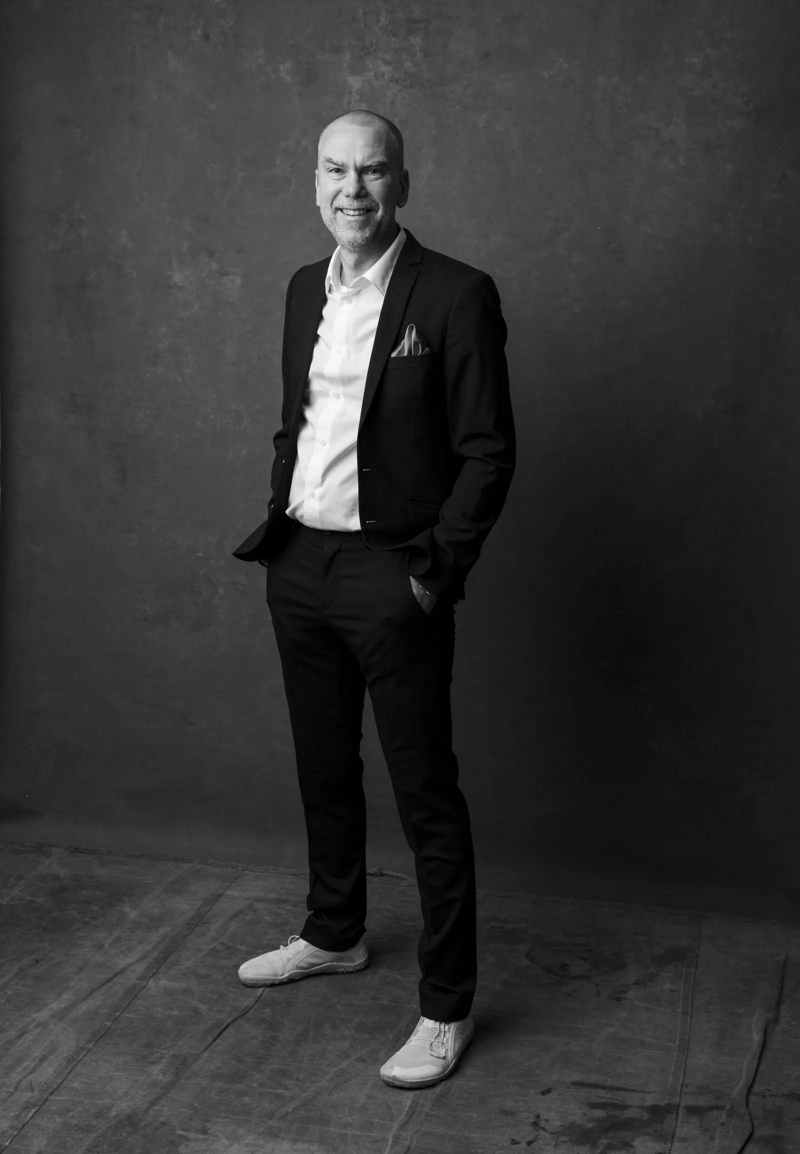 Tomas André AB logotyp